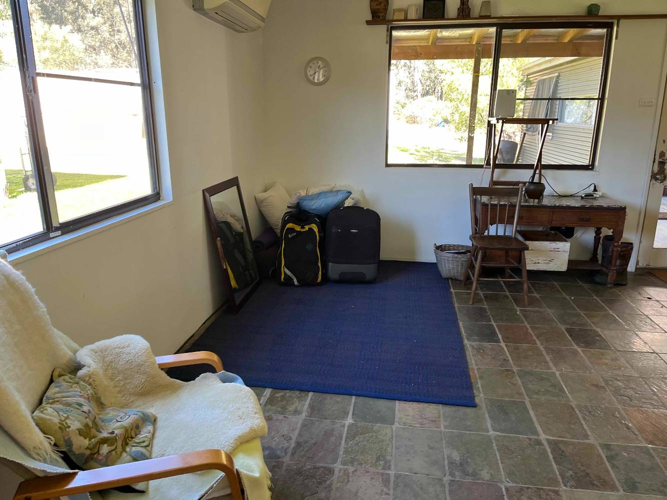 Corner of living room usually kept empty for yoga.