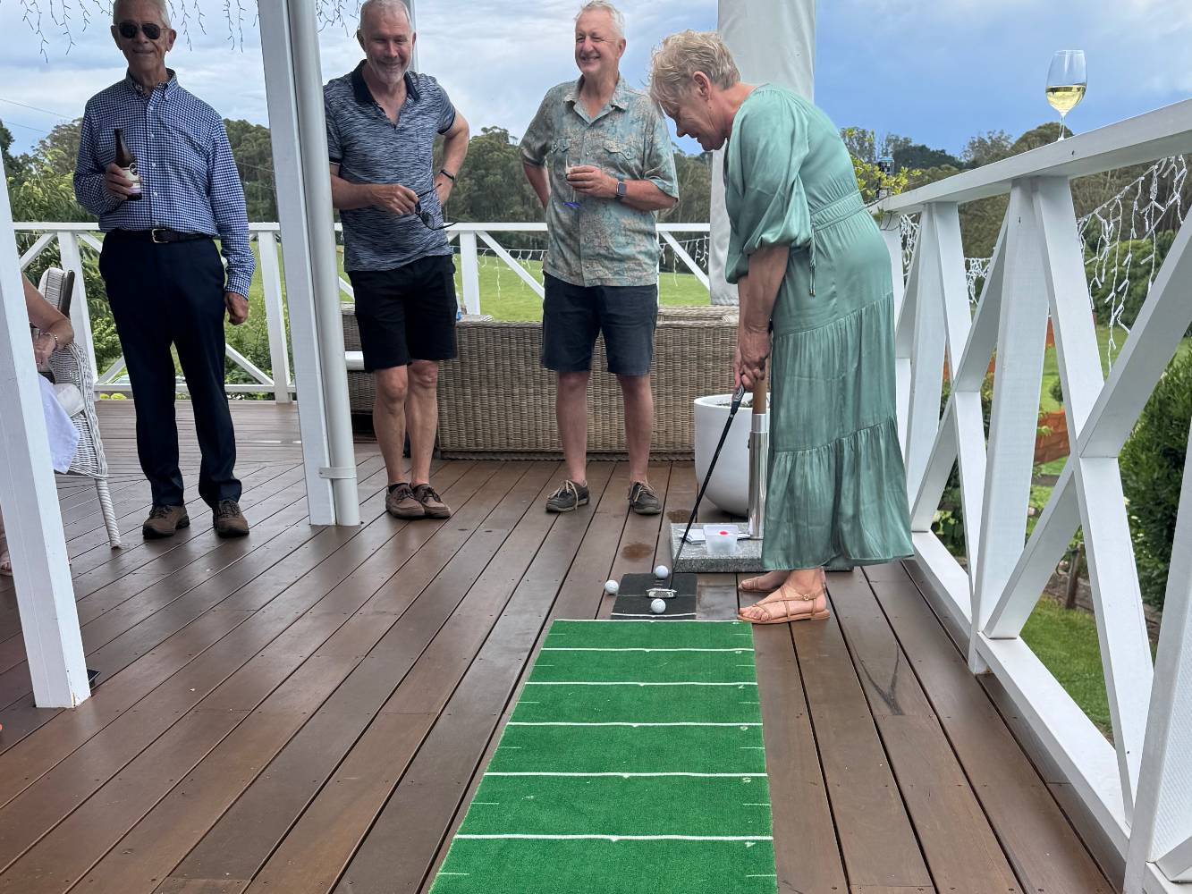 Playing a golf putting comp on deck