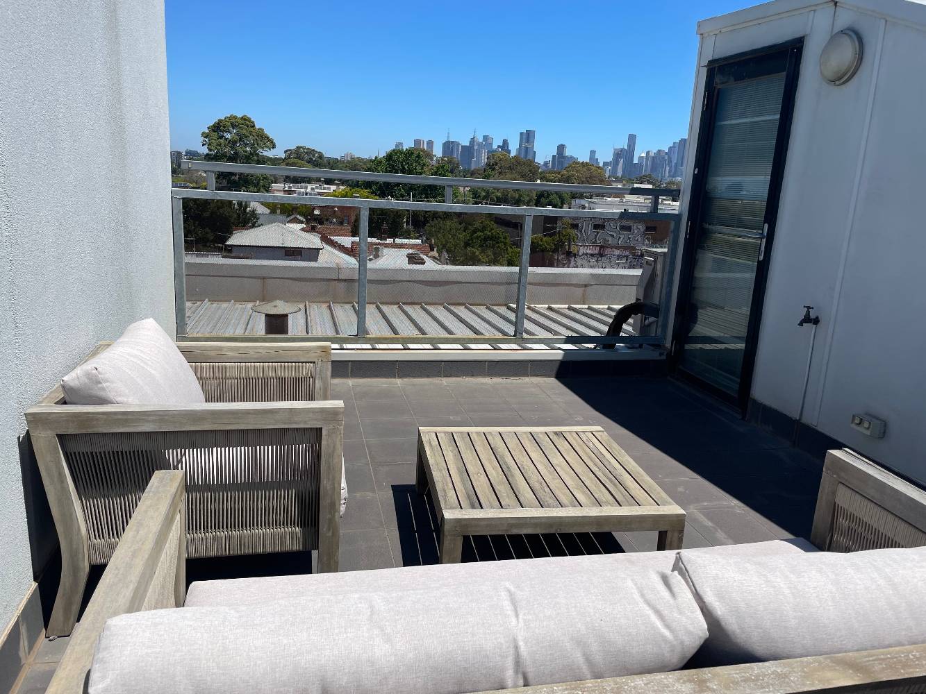 Private rooftop with views of Melbourne CBD