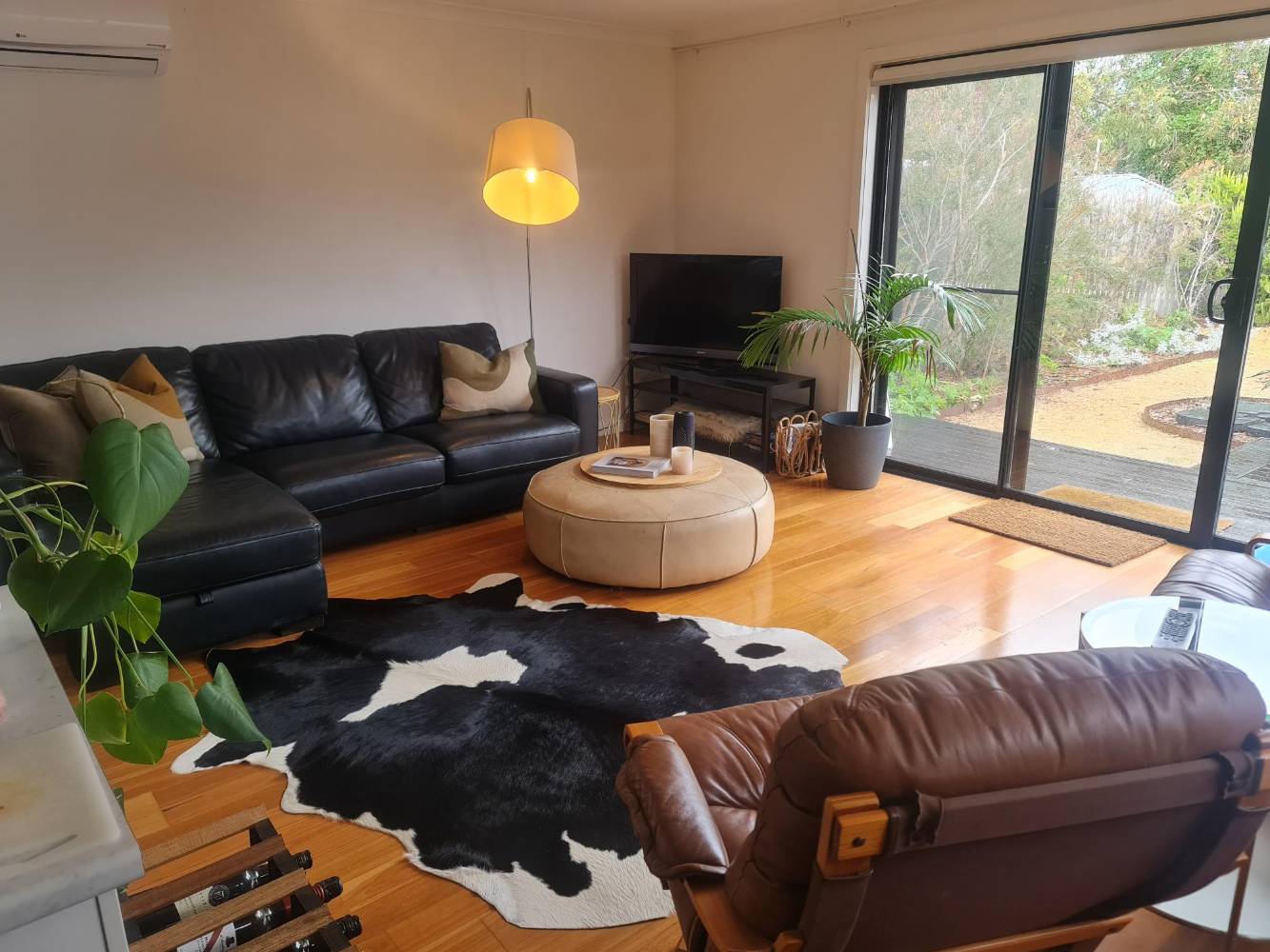 Living area opening to sunny courtyard