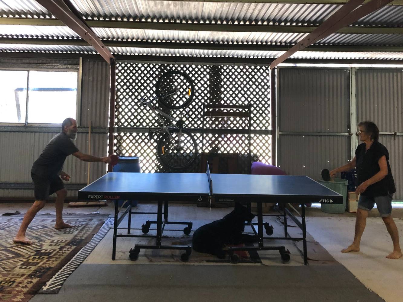 Playing ping pong in the shed, thw and the Lithgow club kindly donated a good but old competition table.ere are now two tables because we have group play every week no