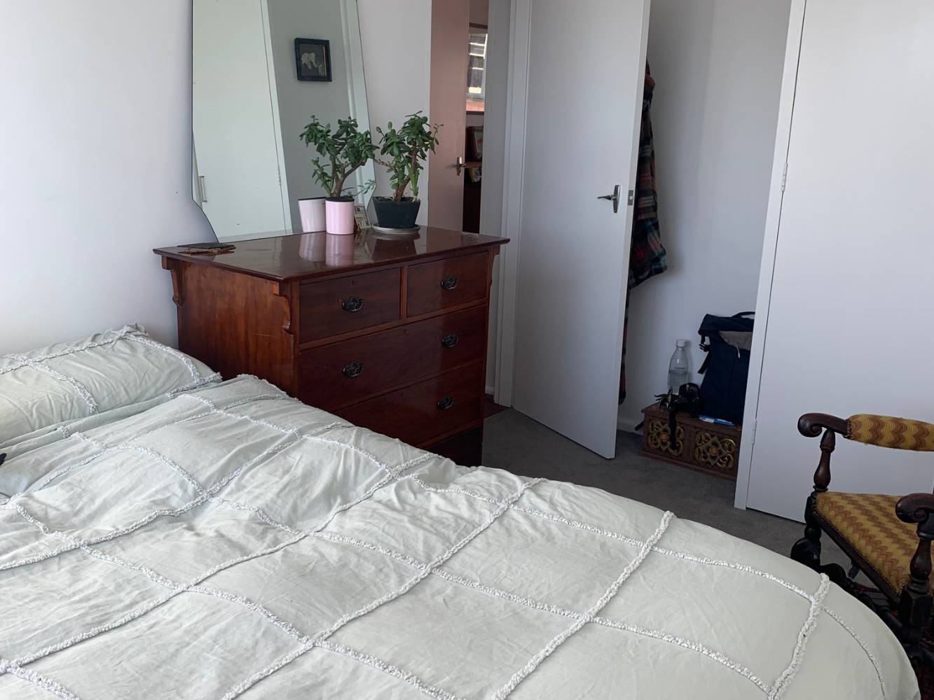 comfy queen bed with parisian roof top views through large window!