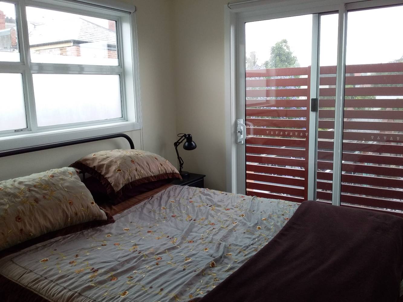 main bedroom with balcony