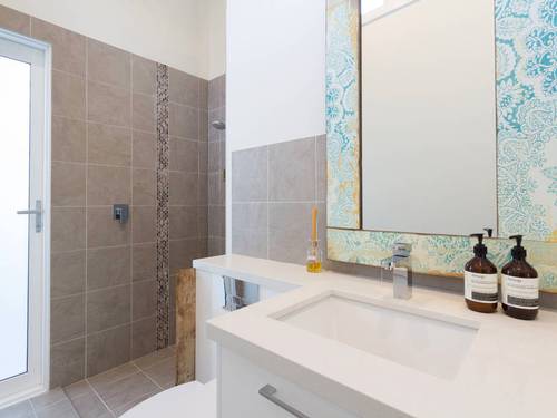 Bathroom with laundry facilities 