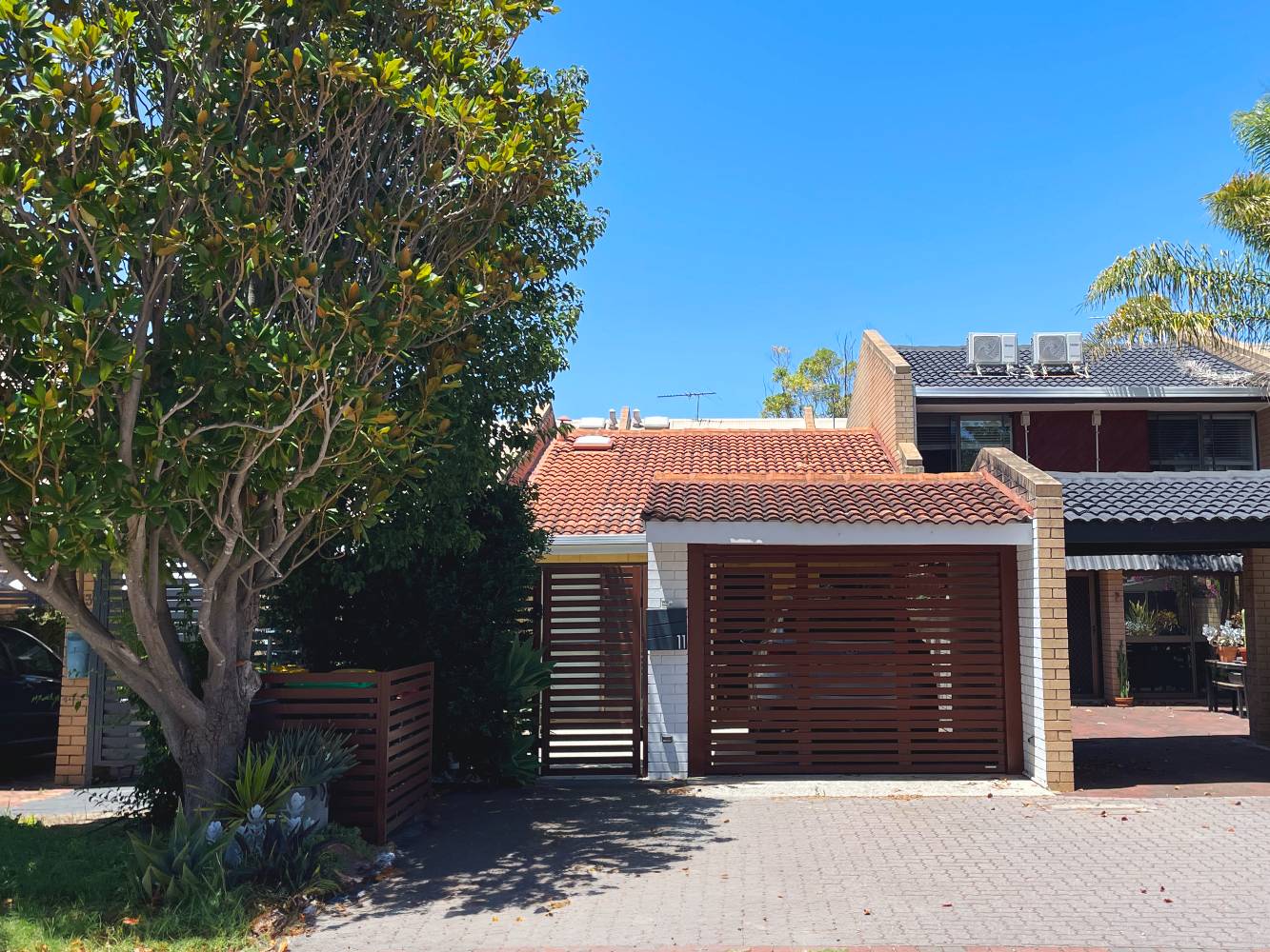 Front of house + carport