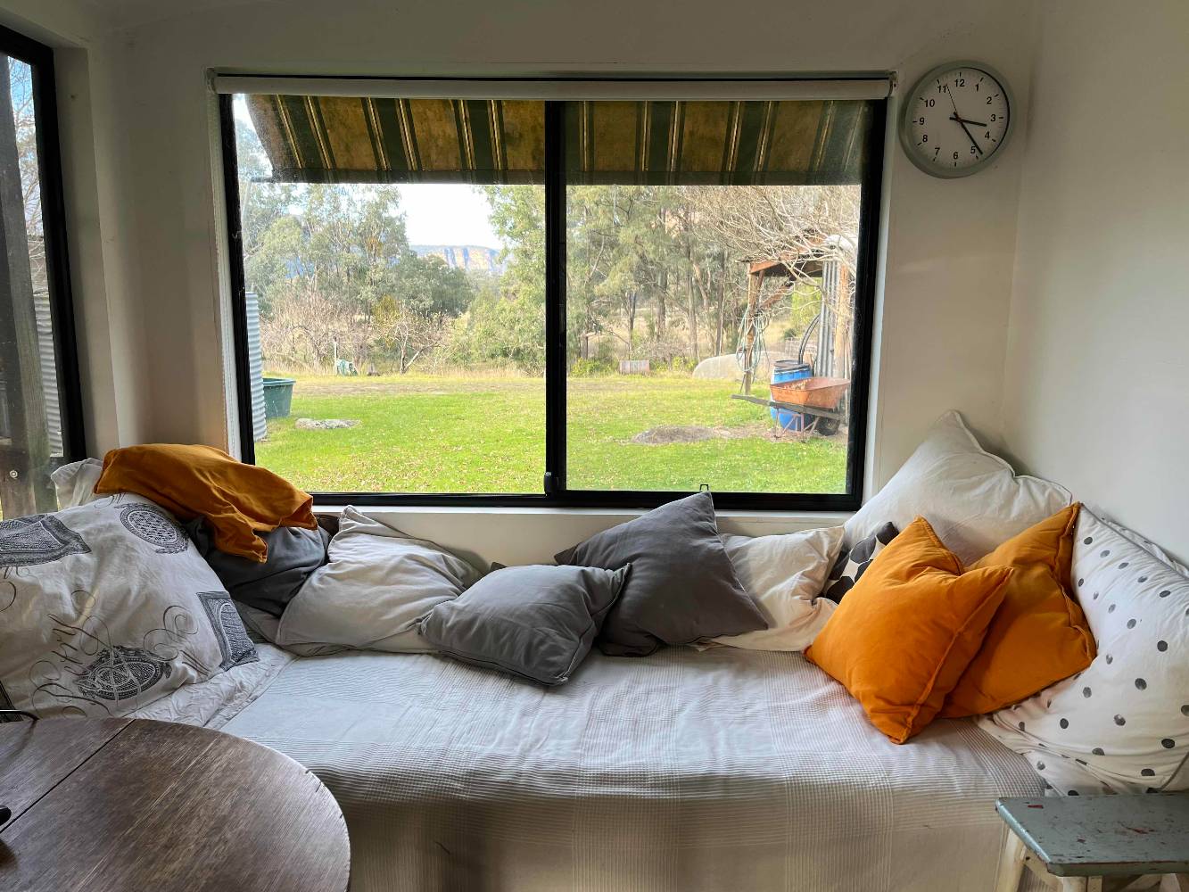 Daybed at one end of kitchen, a favourite spot for hanging around. Extra bed.