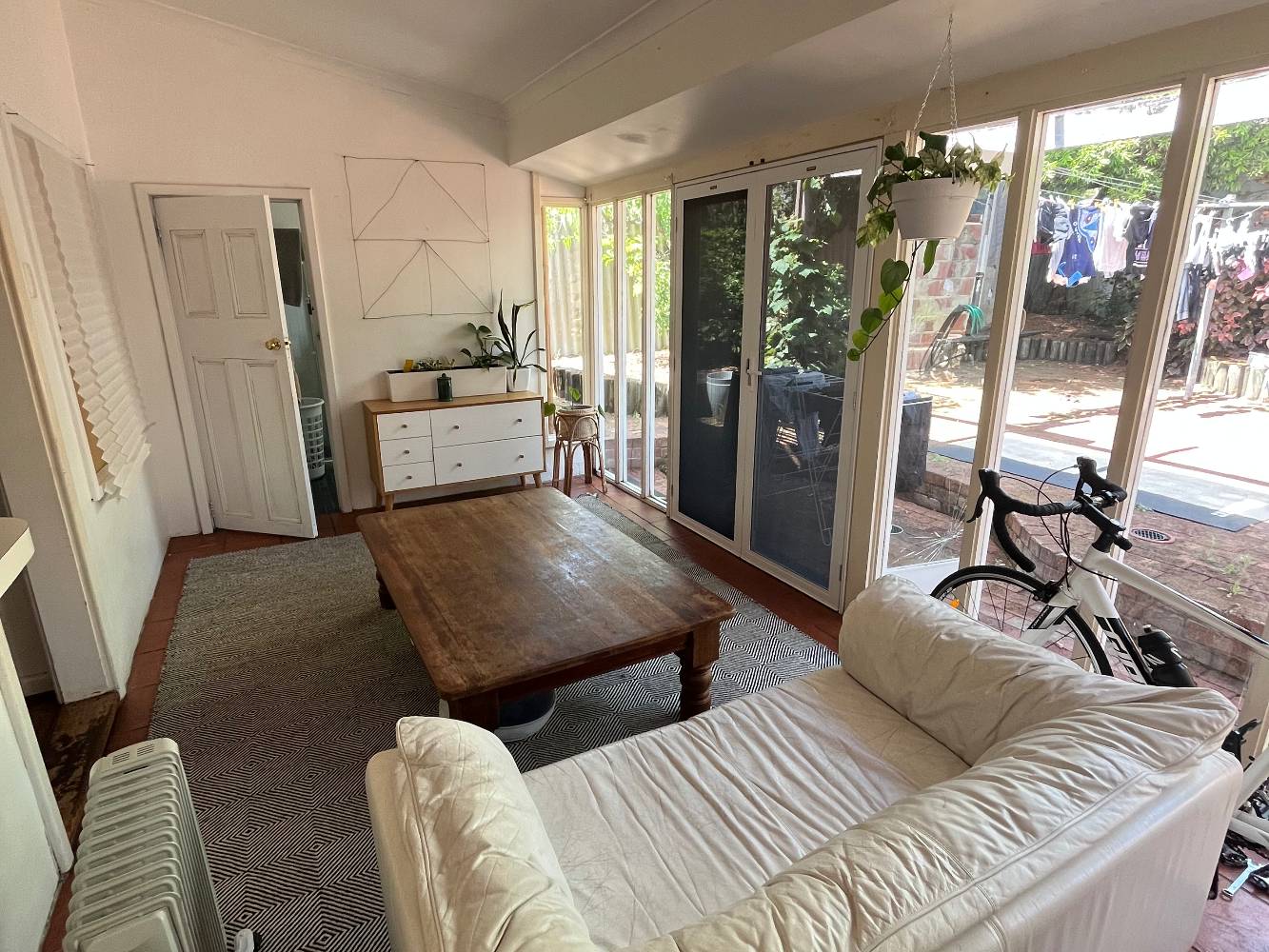 this is our dining room - note the low coffee table IS our table. Other option is the table out the front