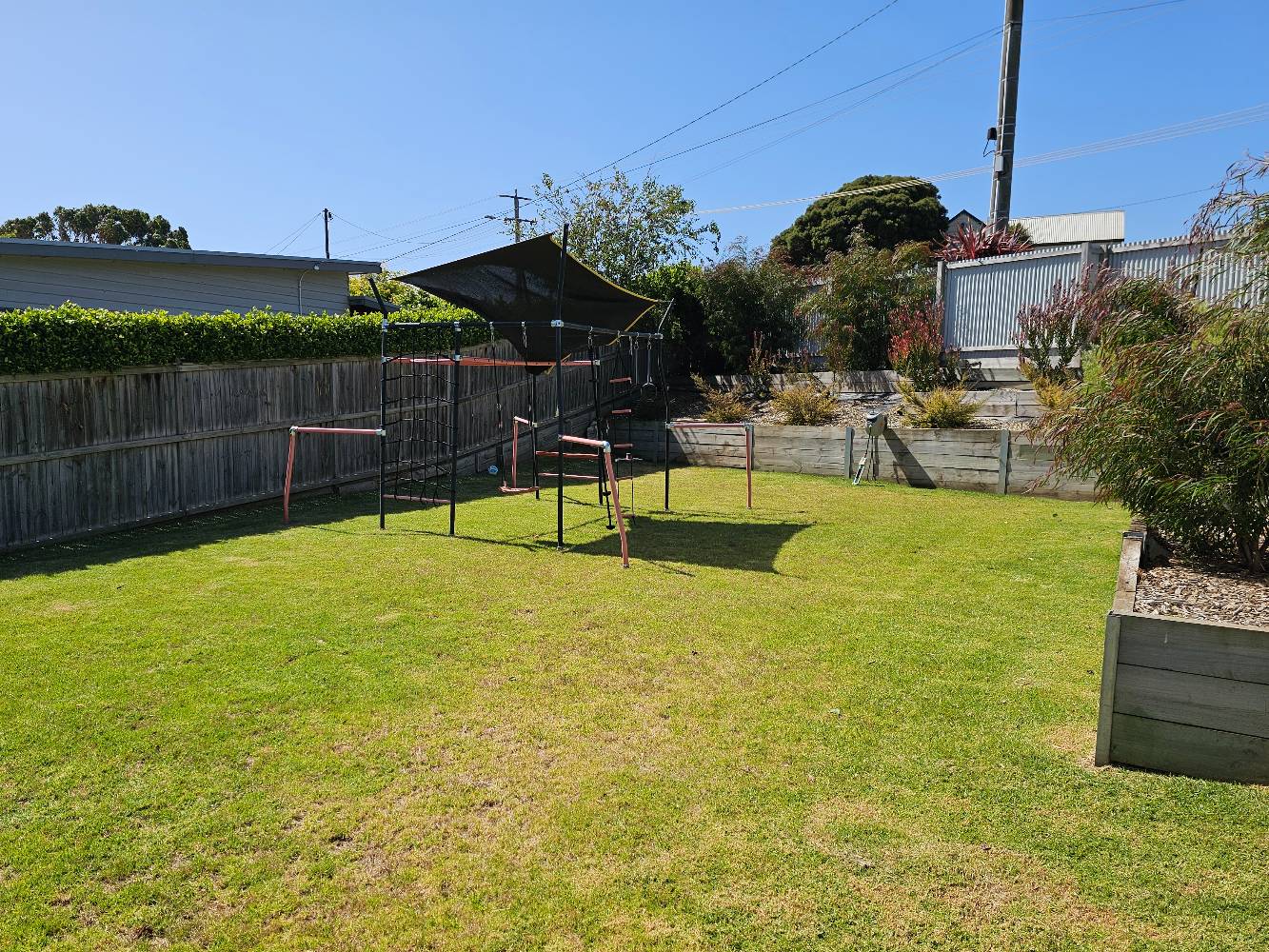 Private front yard with play equipment